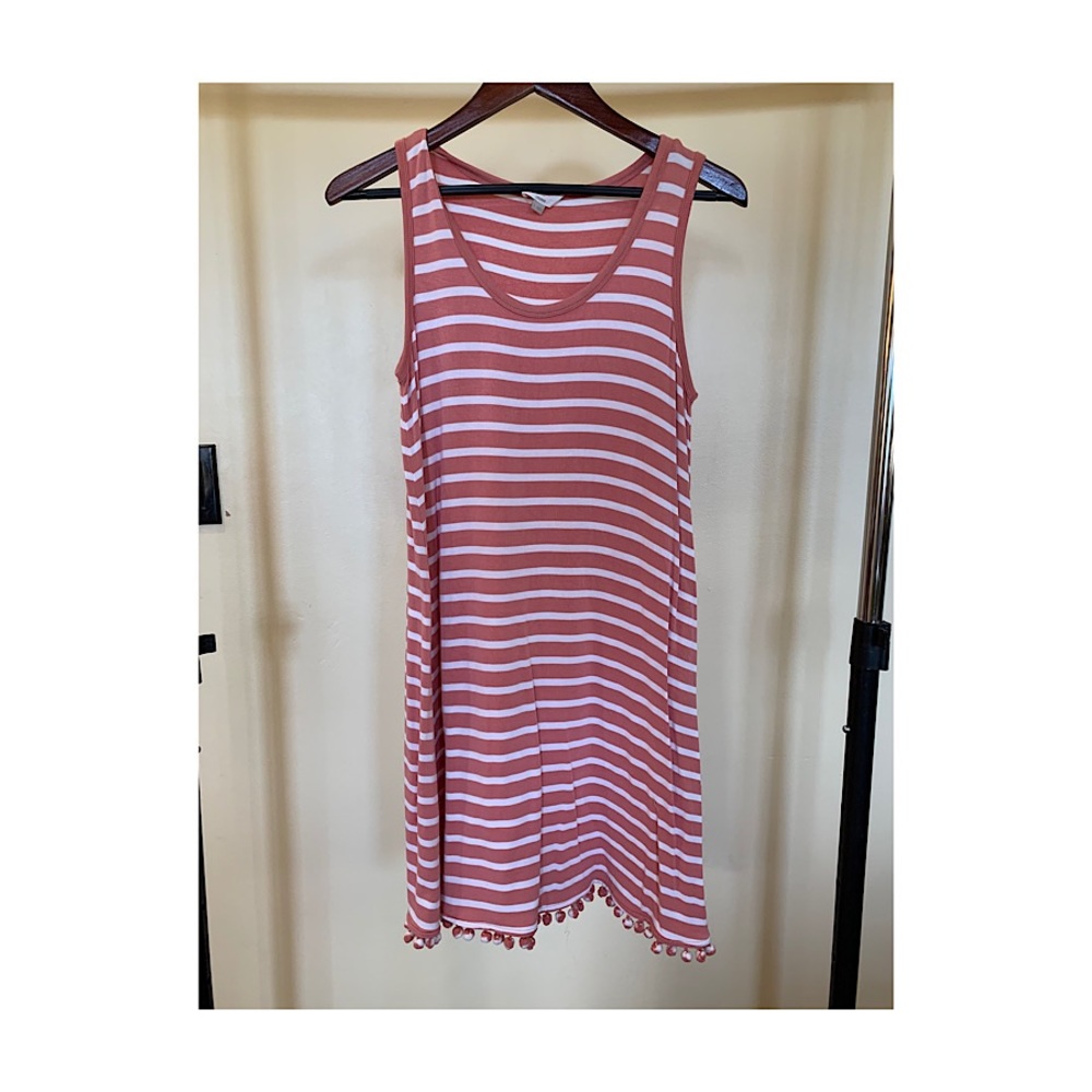 Pink and white striped dress with pompom details